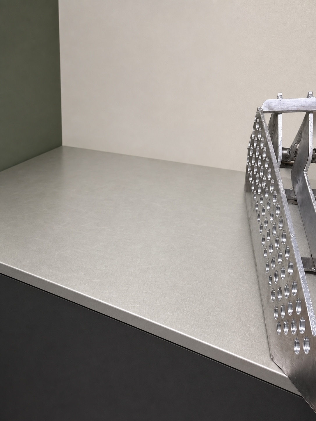 Clean workbench view of a precision steel fabrication project.